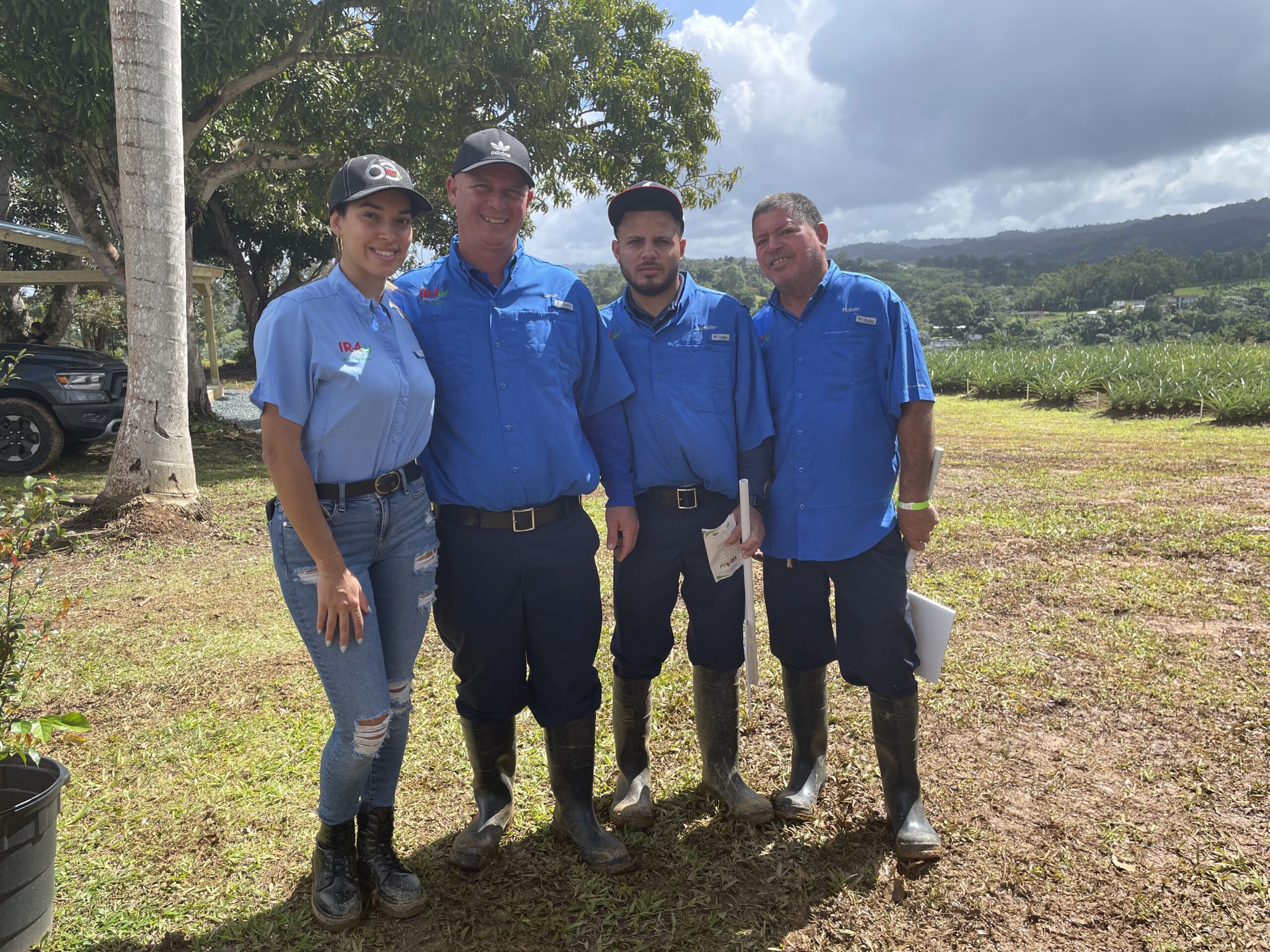 University of Puerto Rico research collaborators pose during the 2023 National Education Conference agricultural tour of the Corozal Agriculture Experiment Station.